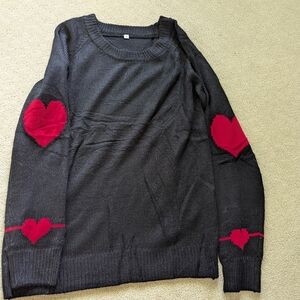 Black sweater with heart embroidery on elbows